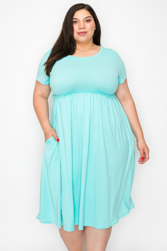 Plus size shirred solid dress with side pockets